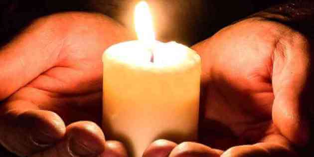 person holding candle. What is an Entrepreneur? Blazetrue article